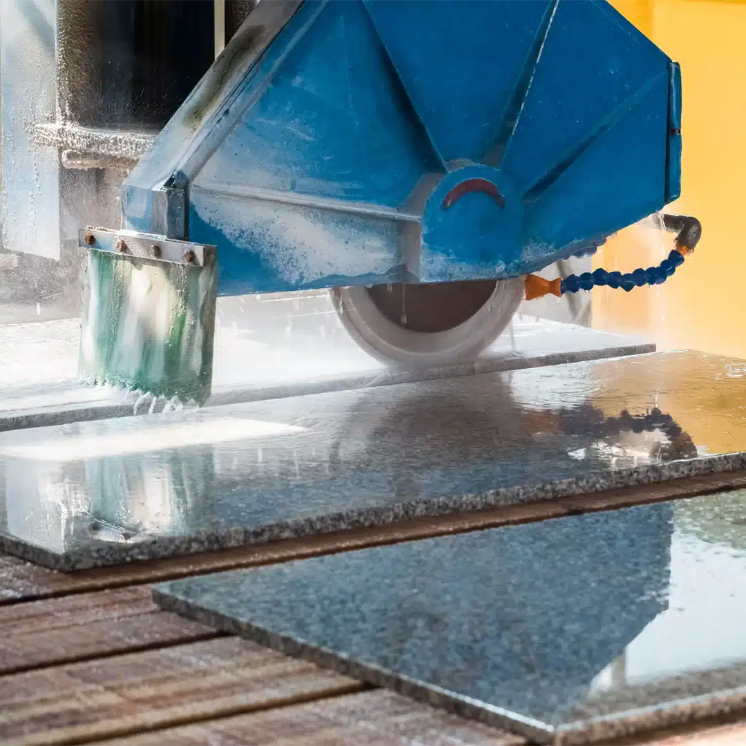 Machine Cutting Granite with Precision - The Reigate Marble Shop
